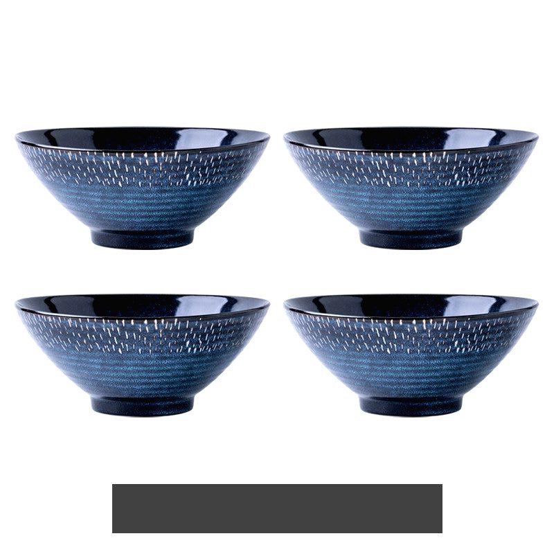 Ensemble de quatre bols à ramen Miyasato bleus sur fond blanc