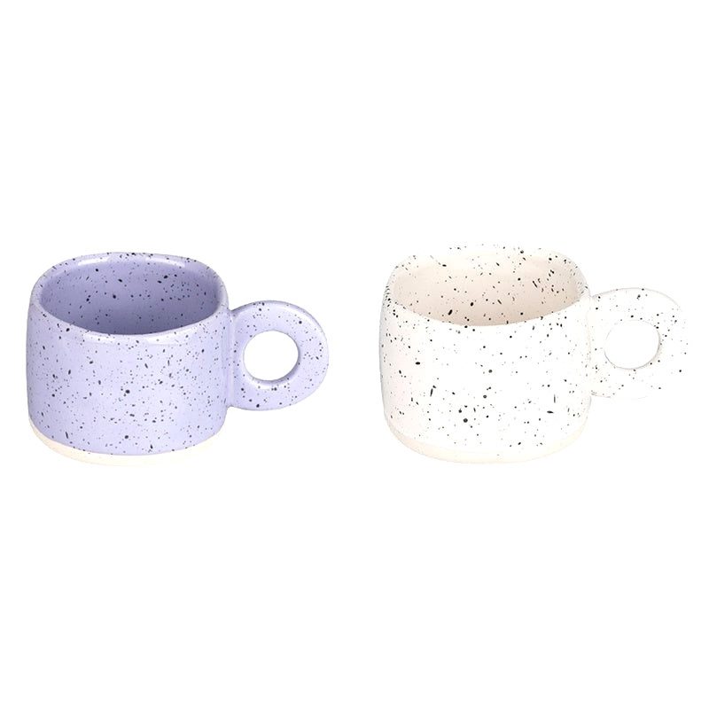 Tasse Nebula mauve et tasse blanc cassé côte à côte