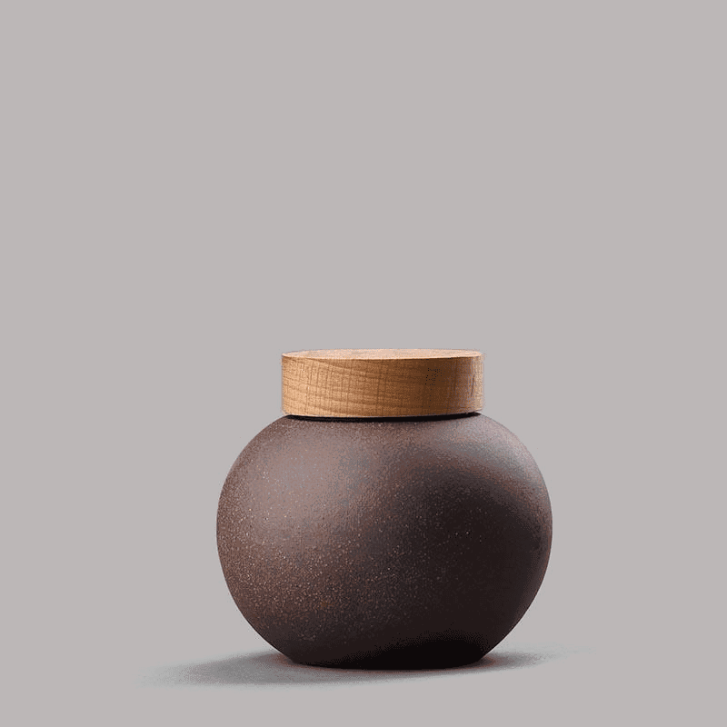 Pot à thé Sunada modèle rond en céramique brune, de profil