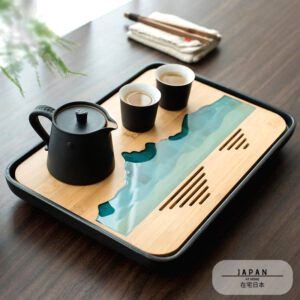 Plateau à thé Montagne rectangle noir avec théière et deux tasses sur une table