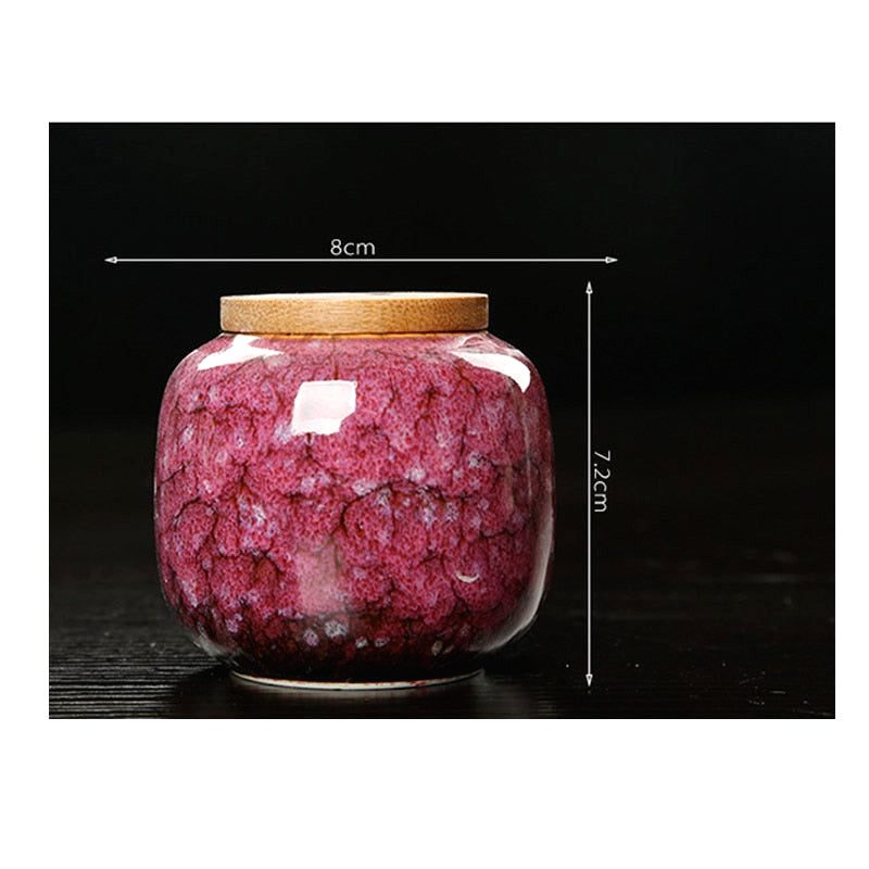 Boîte à thé Hattori rose sur fond noir, avec schéma des dimensions