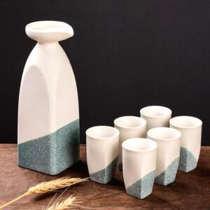 Carafe à saké Iwao blanc et vert avec ses tasses sur une table