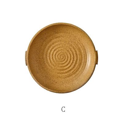 Seconde taille de l'assiette japonaise Watsuji jaune moutarde, vue de dessus sur fond blanc