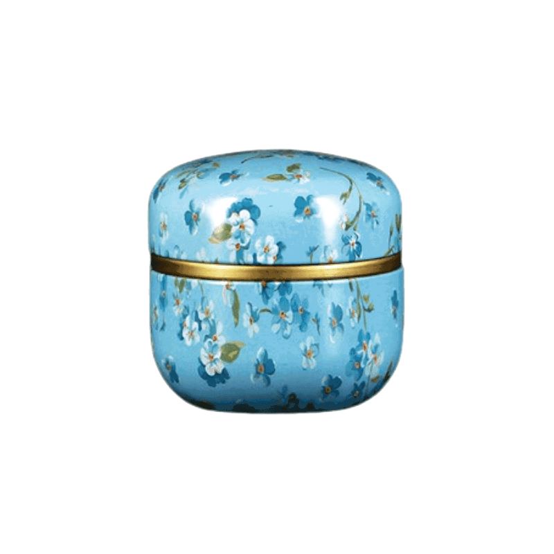 Boîte à thé Soma bleu clair à petites fleurs, de face