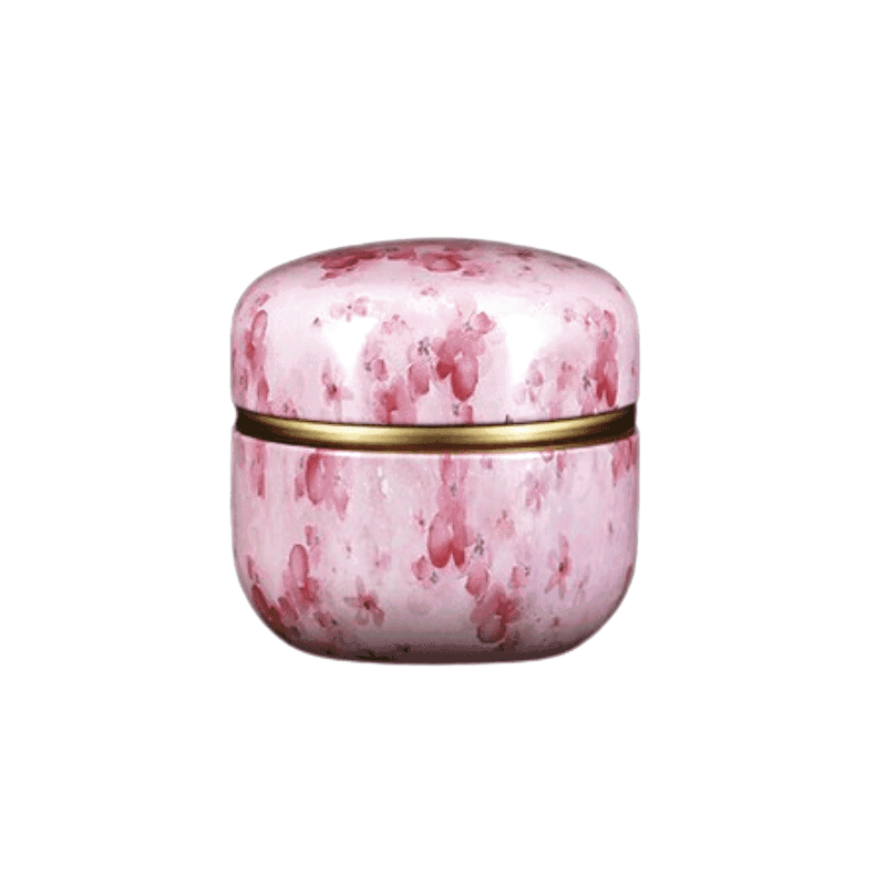 Boîte à thé Soma rose marbrée, de face sur fond blanc