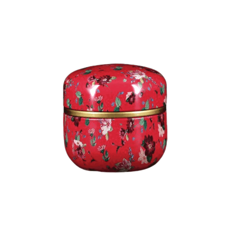 Boîte à thé Soma rouge à petites fleurs, de face sur fond blanc